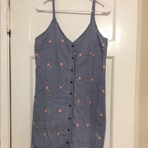 Blue gingham dress with pink flower detail